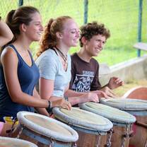 VISIONS participants in a Gwoka drumming workshop