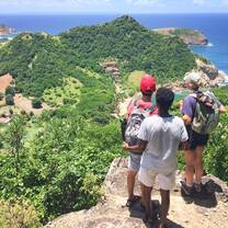 VISIONS participants take an afternoon hike after a morning of service work