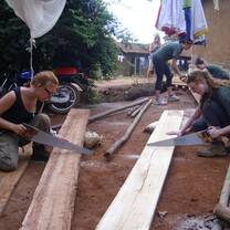 RWEYOWA volunteers during the construction of chicken shelter. 