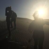 Sand boarding at the dunes of Huacachina