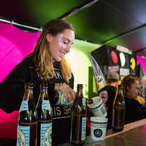 bartender at springfest pouring beer