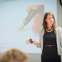 Female giving lecture