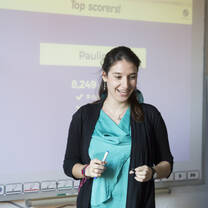 A new teacher in front of the board