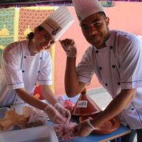Students cook tagine in a cooking contest