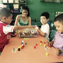 Ms. Perla (former SJBA student, and now Prepa Teacher) developing fine motor skills with SJBS students.