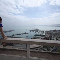 A traveler overlooking a port in Chile.