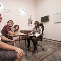 students in a classroom smiling