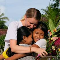 Nora with two student at the Goodbye ceremony
