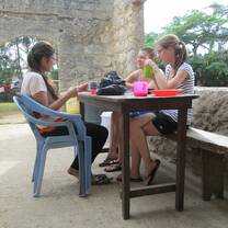volunteers having breakfast before they start their activities