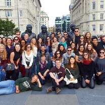 group of students in england smiling 