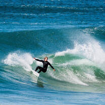 person surfing on a wave