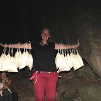 Austrop volunteer with bat bags on bat conservation program