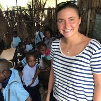 kululeku volunteer smiling with children