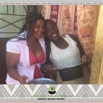 two women smiling for the camera
