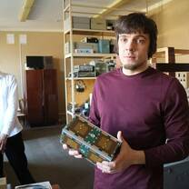 Student holding technology
