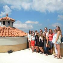 group of students on roof of building 