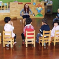 Teacher in front of class of Chinese students