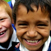 Two little boys smiling