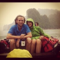 Get Paid to Teach English in Chiang Mai, Thailand group with hoods on boat on river