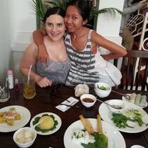 girls at table with Vietnamese food
