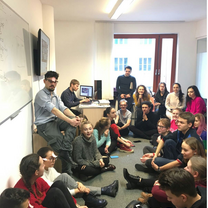 group of people inside the small room