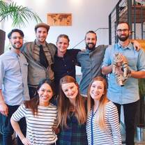 Young people posing for a group photo.