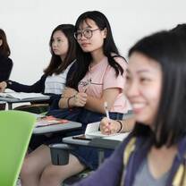 All girl are carefully listening to someone