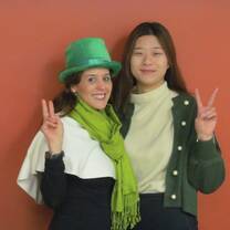 Two ladies with peace sign