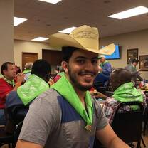 man wearing a big hat