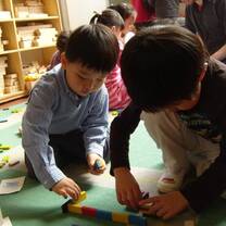 two boys playing blocks