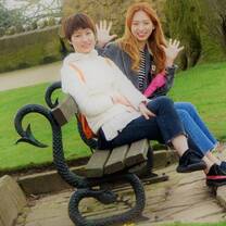 Two ladies sitting on the bench