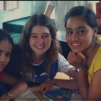 three young ladies smiling