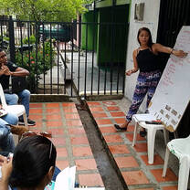 Group holding a meeting.