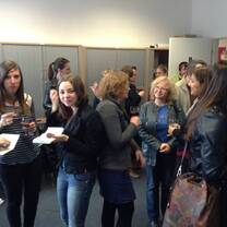 standing ladies talking to each other