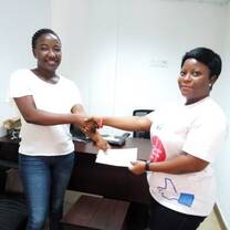 Two woman handshaking