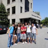 Group of teens standing outside the building