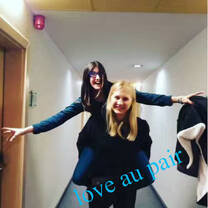 two girls in the hallway