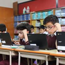 students are busy with their laptop