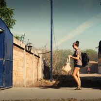 The girl jump our from the bus