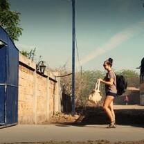 The girl jump our from the bus