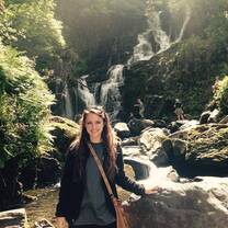 A woman at a falls.