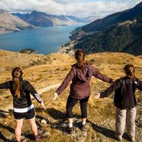 Three women at the mountains.