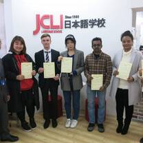 Group of people handling a paper