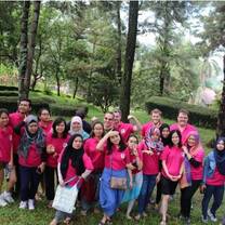 men and women wearing pink shirt