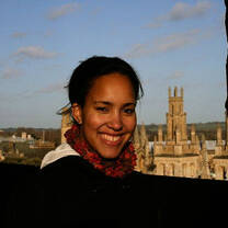 Woman student posing in front of Oxford 