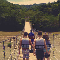 walking on a long hanging bridge
