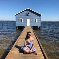 Blue sky, blue house, blue dress