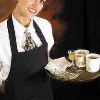 young lady wearing white shirt and a black apron