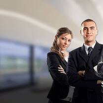 Four persons in corporate clothes.