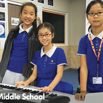 Three young girl inside the music room